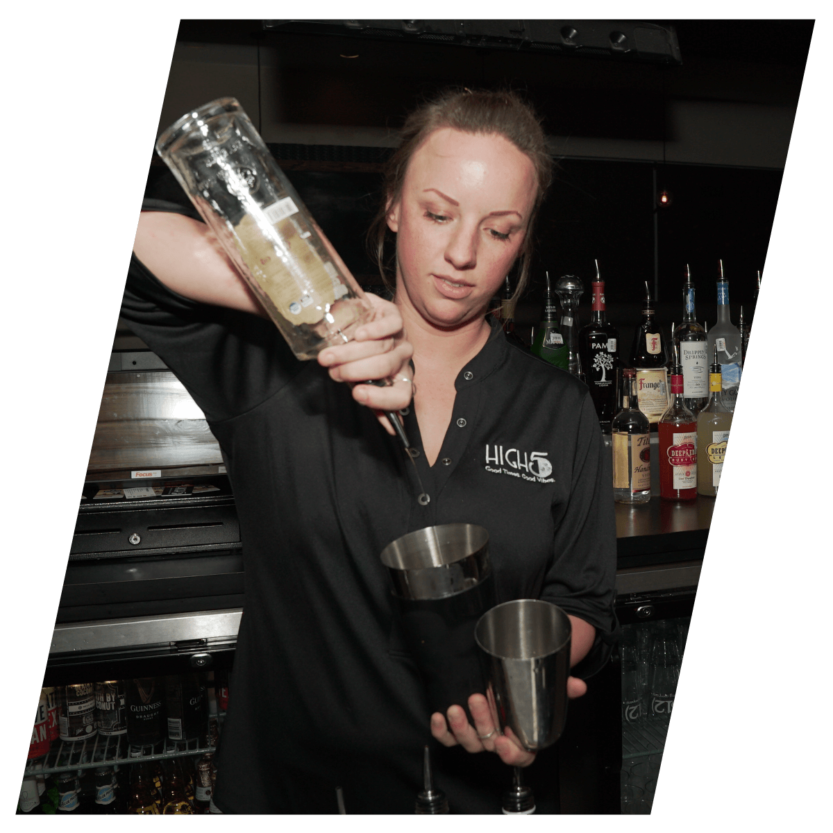 andersonamenities3 lady-pouring-drink at High 5 Austin