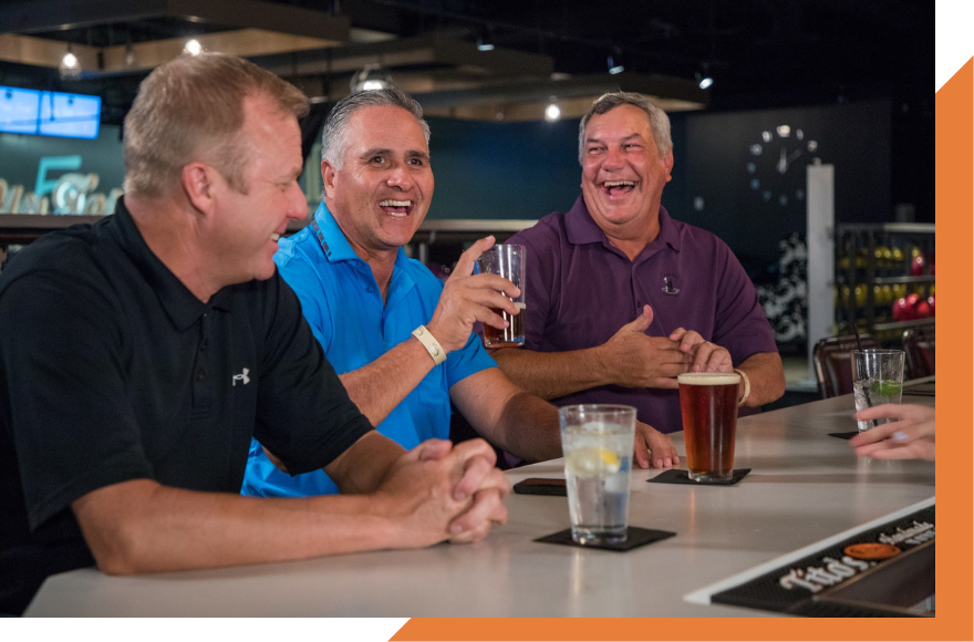 Men watching sports at High 5 sports bar in Austin
